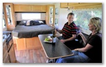Airflow Caravans: Interior showing TV and kitchen top