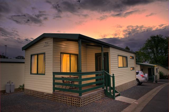Eureka Stockade Holiday and Caravan Park   - Ballarat: View of cabin 1 with evening lights
