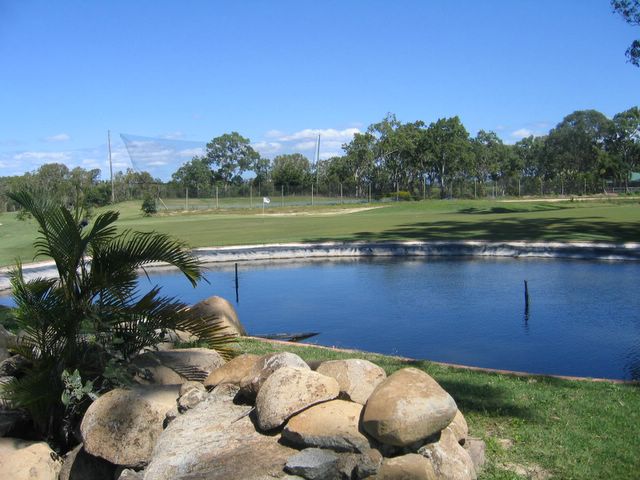 Black Springs Golf Course - Bakers Creek Mackay: Green on Hole 9 with surprise water trap
