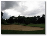 Pacific Golf Course - Carindale Brisbane: Green on Hole 7 with large bunker on approach.