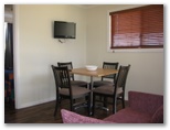 John Oxley Caravan Park - Coonabarabran: Dining area with digital flat screen television which gives excellent reception.