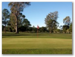 Coraki Golf Course - Coraki: Green on Hole 1 looking back along the fairway.