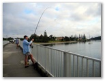 Silver Sands Holiday Park - Evans Head: Fishing from the bridge on the Evans river