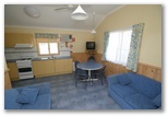 Forster Beach Holiday Park - Forster: Kitchen and lounge room.