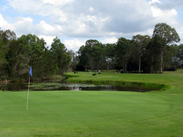 Gainsborough Greens Golf Course - Pimpama: Green on Hole 17 looking back along the fairway.