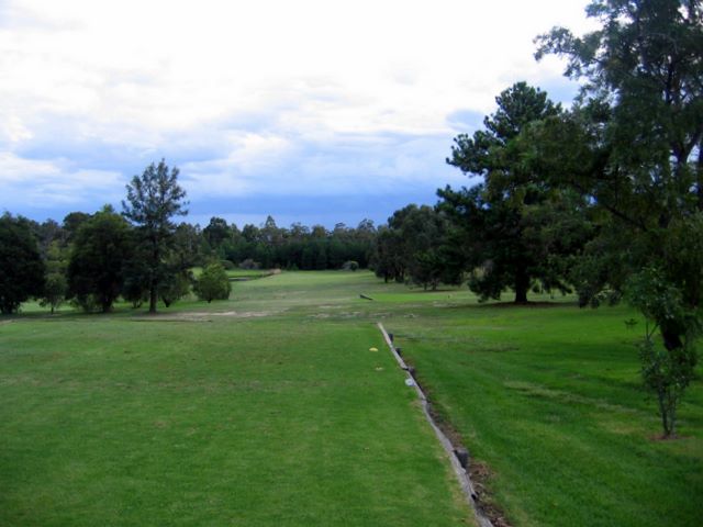 Kurri Golf Club - Kurri Kurri: Fairway view Hole 7 with the green curving to the left across a creek