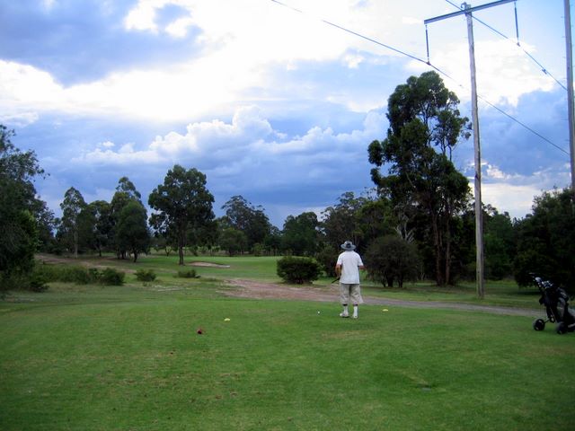Kurri Golf Club - Kurri Kurri: Fairway view Hole 8 with storm brewing in the distance