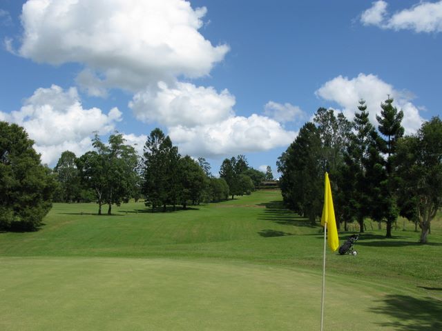 Kyogle Golf Course - Kyogle: Green on Hole 4 looking back along the fairway.