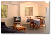 Riverview Tourist Park - Margaret River: Lounge and dining room area in cottage