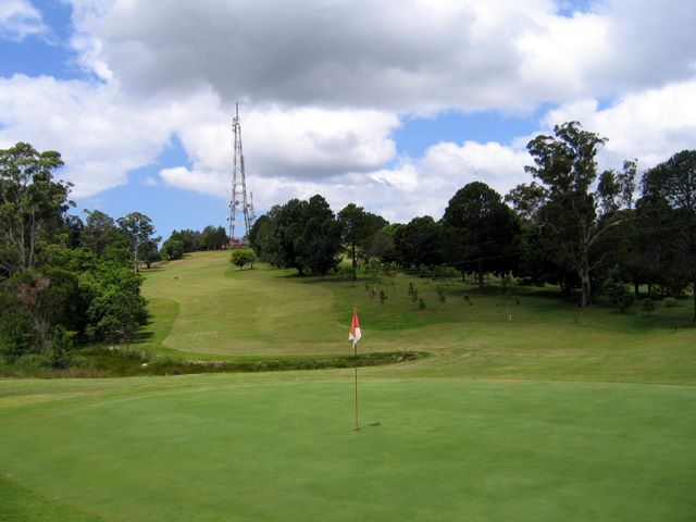 Tamborine Mountain Golf Course - Mt Tamborine: Green on Hole 1 looking back along fairway to telecommunications tower