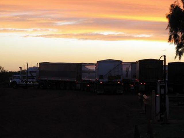 Pardoo Roadhouse Caravan Park - Pardoo: Trucks at sunset.