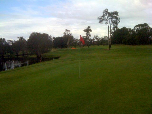 Parkwood International Golf Course - Parkwood, Gold Coast: Green on Hole 2 looking back along the fairway.