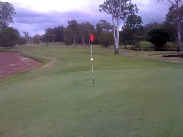 Parkwood International Golf Course - Parkwood, Gold Coast: Green on Hole 9 looking back along the fairway.