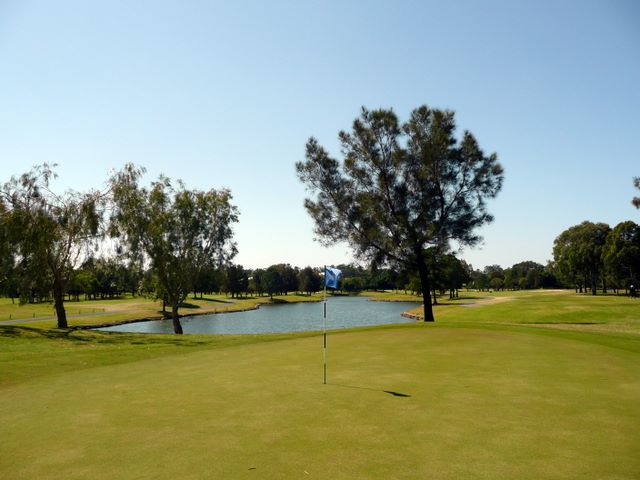 Royal Pines Golf Course - Benowa: Green on Hole 2 looking back along fairway