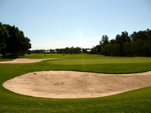 Royal Pines Golf Course - Benowa: Green on Hole 4 looking back along fairway