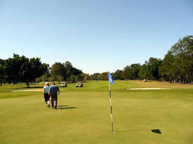 Royal Pines Golf Course - Benowa: Green on Hole 6 looking back along fairway