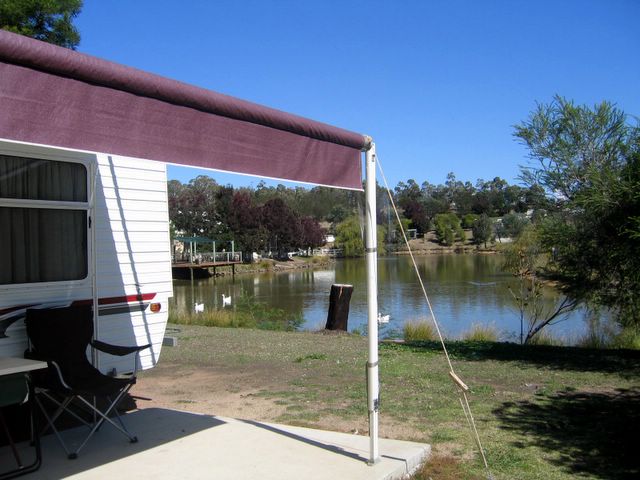 Capital Country Holiday Village - Sutton: Powered sites for caravan with view of the lake