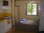 Captain Cook Holiday Village - Seventeen Seventy: Main bedroom in Bungalow