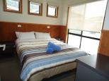 Pisces Holiday Park - Apollo Bay: The bedroom in one of the cabins. 