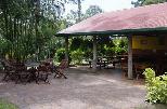 BIG4 Atherton Woodlands Van Park - Atherton: Camp kitchen and BBQ area with outdoors dining.