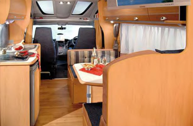 A'van Campers, Caravans, Motorhomes - Penrith: Beautifully crafted timber furniture and deluxe fittings add comfort and functionality to the spacious living and kitchen areas.