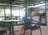 Barraba Caravan Park - Barraba: Camp kitchen and BBQ area overview
