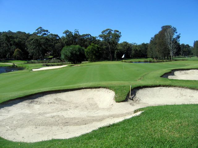 Bayview Golf Club - Bayview: Green on Hole 8 surrounded by lots of bunkers.