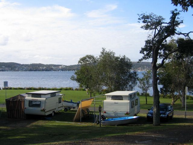 Belmont Pines Lakeside Holiday Park - Belmont: Powered sites for caravans looking west towards the lake