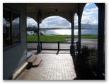 Zane Grey Tourist Park - Bermagui: Late afternoon sunlight from shopping centre colonnades