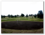 Boorowa Recreation Club Golf Course - Boorowa: Green on Hole 5 looking back along the fairway.