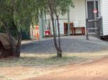 Charleville Bush Caravan Park - Charleville: amenties with washing machine out front