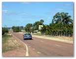 Aussie Outback Oasis Cabin & Van Village - Charters Towers: View of the park from the main road