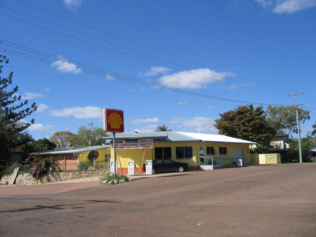 Mexican Tourist Park - Charters Towers: View of the park from the main street.  The park has a service station and convenience store.