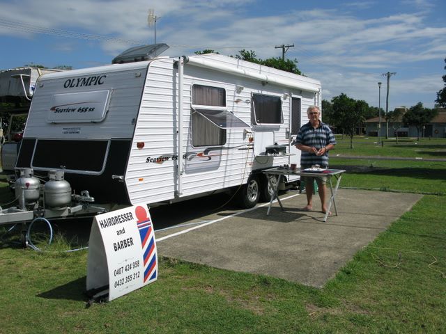 Park Beach Holiday Park 2009 - Coffs Harbour: Alan funds his travels around the country cutting hair - how enterprising!