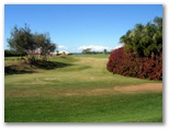 Coral Cove Golf Course - Coral Cove: Fairway view Hole 1 - the green is around the right corner