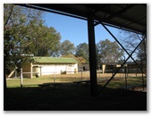 Cowra Showground Caravan Park - Cowra: View from underneath the grandstand showing amenities.