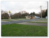 Crookwell Caravan Park - Crookwell: Park overview showing paved roads, concrete slabs for powered sites and amenities block.