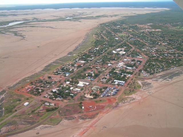 Kimberley Entrance Caravan Park - Derby: the 1000 Islands flight returning over the township of Derby which lies on a peninsula in King Sound , the Mud flats flood only once a year on a king tide.