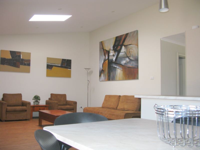 Wollongong Surf Leisure Resort - Fairy Meadow: Dining and lounge room in two bedroom terrace apartment