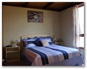 Flinders Island Cabin Park - Flinders Island: Bedroom in eight bed lodge.