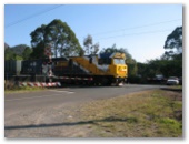 Steve Irwin Way - Glass House Mountains: Railway crossing - watch for trains.