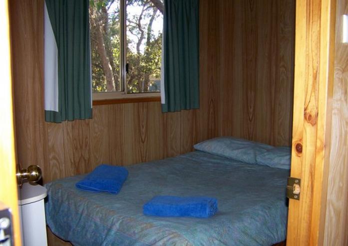 Gracetown Caravan Park - Gracetown: Interior of cabin showing bedroom.
