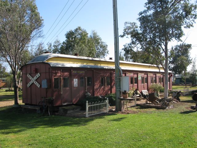 Griffith Caravan Village - Griffith: Historic train carriage with lots of bits and pieces