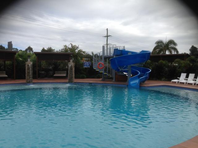 Gold Coast Holiday Park - Helensvale: Swimming pool and water slide