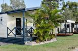 Bimbimbi Riverside Caravan Park - Woombah: As well as cabins there are caravan and camping sites.