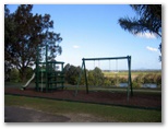 Bimbimbi Riverside Caravan Park - Woombah: Playground for children with million dollar view