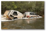 Independent Trailers - Chifley: Tvan camper trailer easily crossing a river