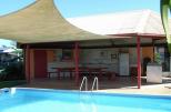 BIG4 Innisfail Mango Tree Tourist Park - Innisfail: Swimming pool in front of camp kitchen