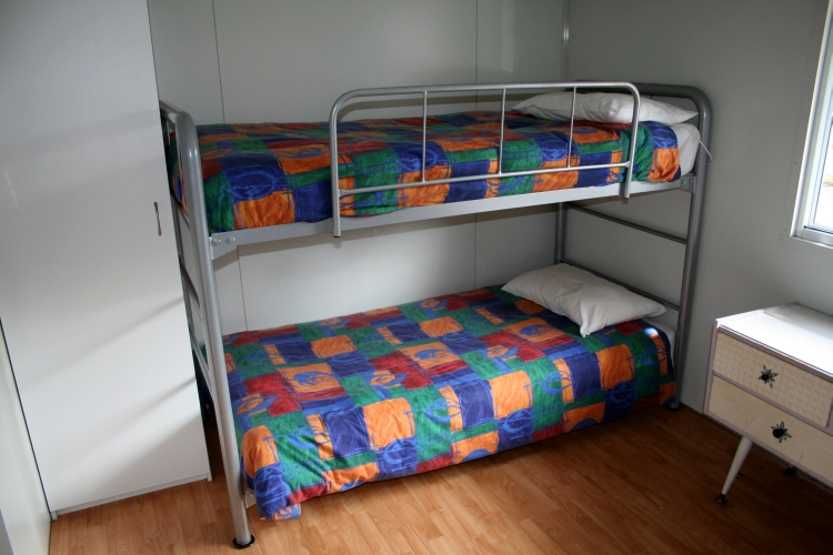 Sapphire City Caravan Park - Inverell: Interior of cabin showing bunk beds