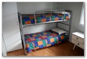 Sapphire City Caravan Park - Inverell: Interior of cabin showing bunk beds